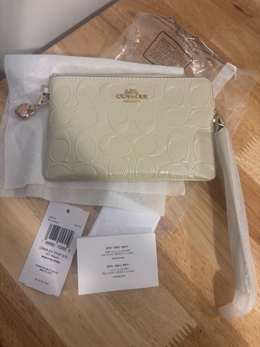 Coach Cream Patent Signature Wristlet with Gold Hardware